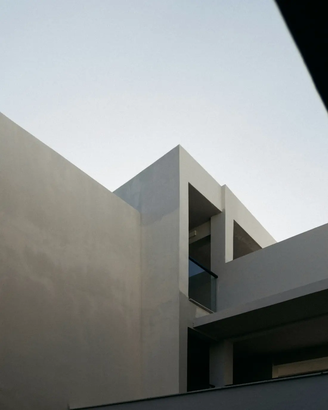 White walls of a modern house against the sky